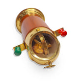 Handcrafted maritime gimbal compass on wooden base